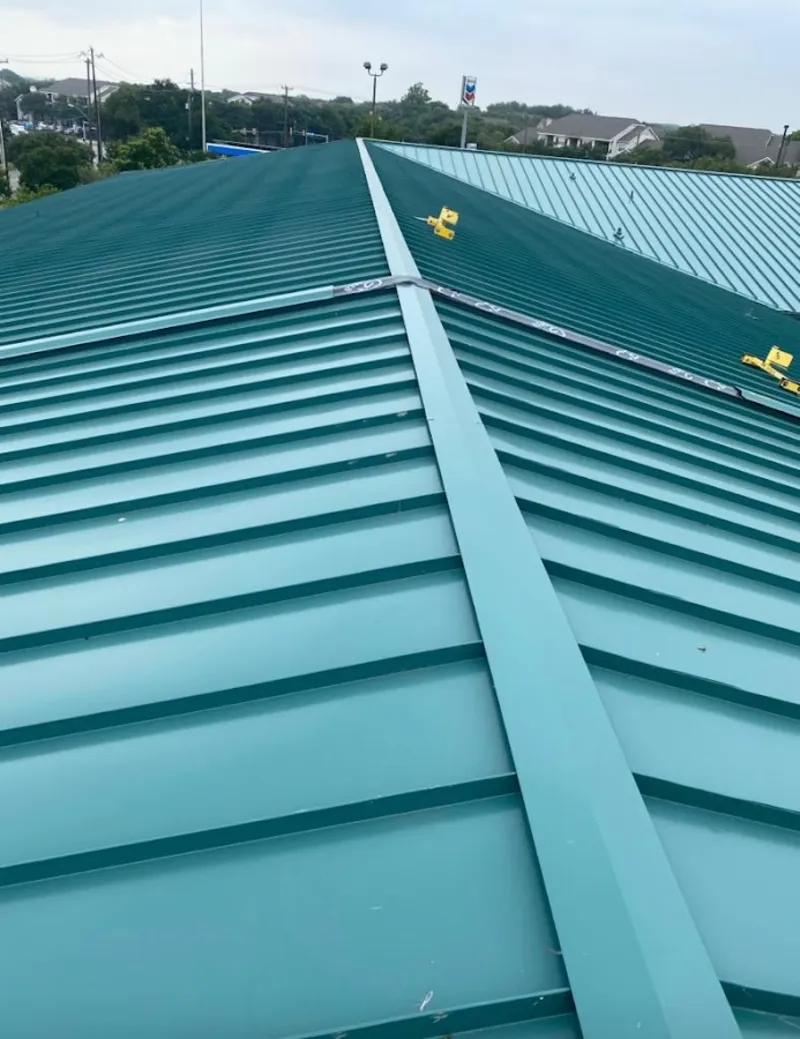Green commercial metal roof ridge and valley for Metal Roof Repair in East St. Louis